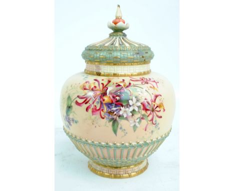A large Royal Worcester blush ivory porcelain jar and pierced cover with moulded wicker basket effect decoration and painted 