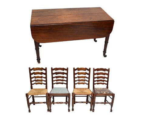 An early 19th century mahogany dining table raised on ring turned supports to brass caps and castors, formerly an extending t