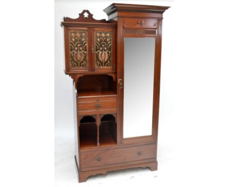SHAPLAND & PETTER; an Art Nouveau mahogany wardrobe of stepped form, the hanging space set with a bevelled mirrored door besi
