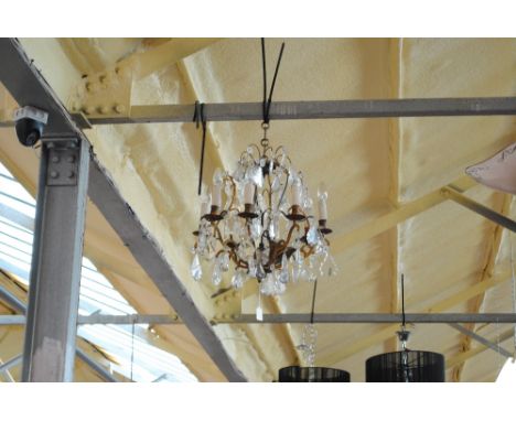 A 19th century gilt metal and glass eight light scrolling electrolier, length approx 50cm.