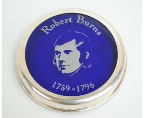 KENNETH JAMES JACK; an Elizabeth II hallmarked silver framed blue glass Robert Burns commemorative circular paperweight, Birm