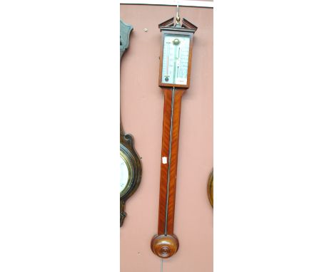 A reproduction mahogany stick barometer, height 95cm.