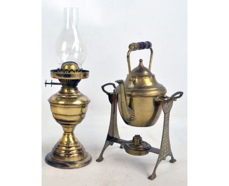 A brass kettle on stand and a brass oil lamp (2).