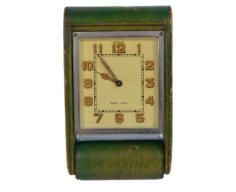 JAEGER LECOULTRE; an eight day leather clad travelling timepiece, length 10cm.   CONDITION REPORT:  Discolouration to the cas