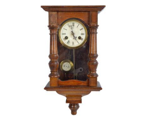 JUNGHANS; a small early 20th century Vienna style wall clock, the circular enamel dial set with Roman numerals, height 50cm (