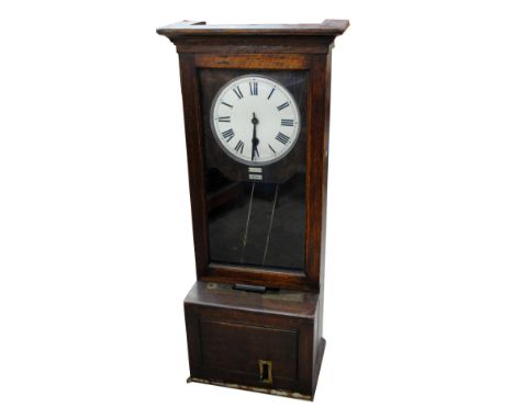 An early 20th century 'Gledhill-Brook' oak cased time recorder with circular dial with Arabic numerals and bearing plaque num