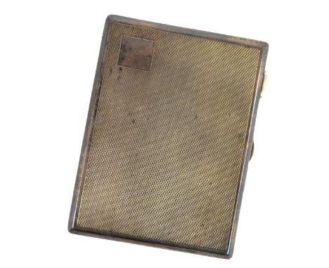 SAMUEL M LEVI; a George V hallmarked silver engine turned decorated rectangular cigarette case with black square cartouche to