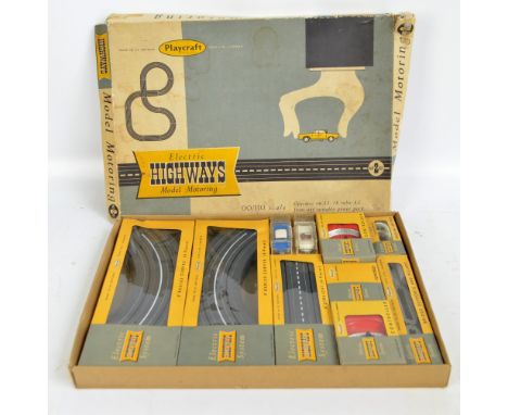 A boxed playcraft electric 'Highways' model motoring OO/HO scale set.