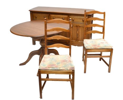 An Ercol six piece dining room suite comprising oval extending table, sideboard and four chairs (6).