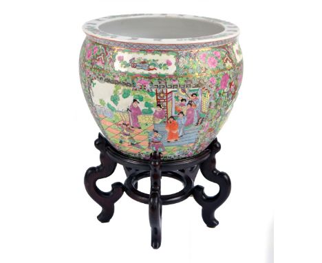 An early 20th century Chinese Canton Famille Rose fish bowl/jardinière, painted with four figural panels on floral and foliat