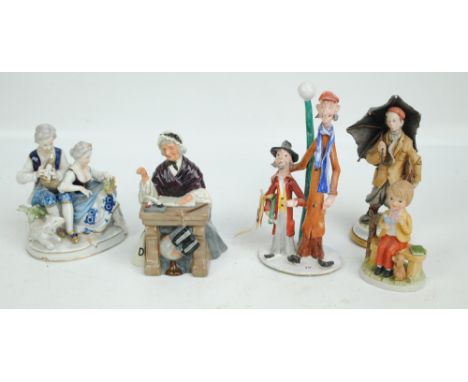 A small group of ceramic figures comprising Royal Doulton HN2223 'Schoolmarm' (chip to end of pointed finger), two Capodimont