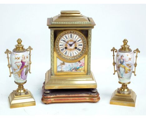 A 19th century French brass mantel clock, the circular dial set with Roman numerals above a shaped painted panel with Achille