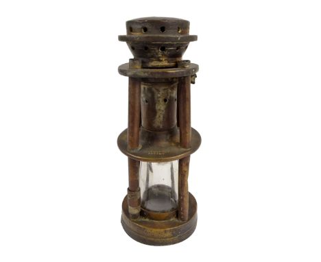 A Hepplewhite Gray Stanley of Derby Ashworth's patent miner's lamp, height 21cm (af).   CONDITION REPORT:  The base is missin