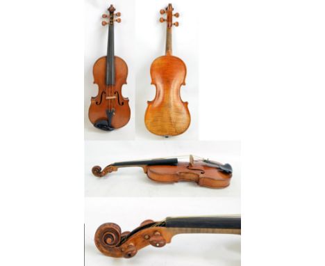 A full size copy of Stradivarius violin with two-piece back measuring 36cm, cased with a bow.