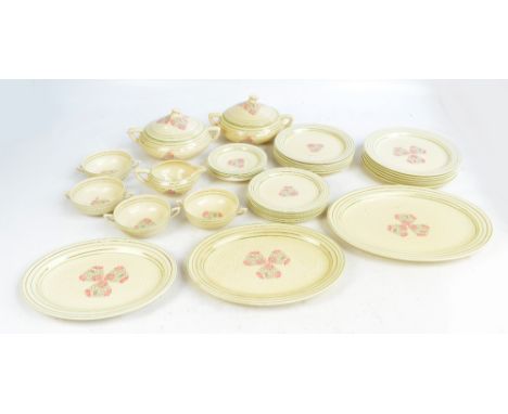 CLARICE CLIFF; a Newport & Wilkinson pottery dinner service decorated with pink flowers on a cream ground with green and silv