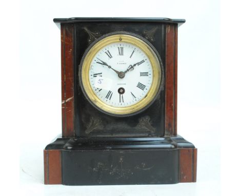 A 19th century black slate thirty hour mantel clock with pink marble details, the circular enamel dial set with Roman numeral