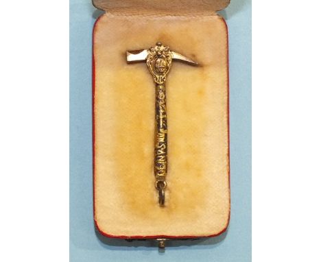 An Italian gilt metal pendant in the form of an ice axe, in fitted leather case labelled 'Romeo Santini', a silver gilt souve