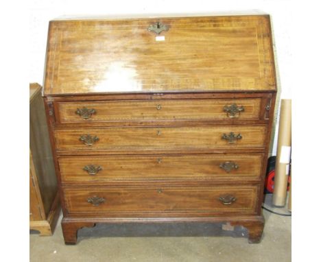 A Georgian inlaid mahogany bureau, the fall front opening to reveal drawers and pigeon holes, above four graduated drawers, o