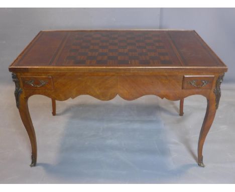 A French games table, with parquetry chess board top, having green baize top to reverse, enclosing backgammon board, with an 