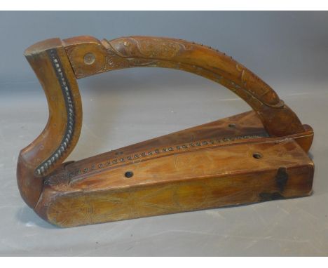A harp carved with beast heads and Celtic designs, reputedly from set of Lovejoy, having no strings, H.79cm 