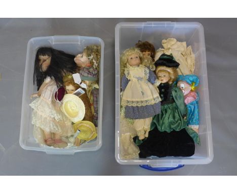 Collection of ceramic dolls and handmade clothes, approx 25, late 20th century. 