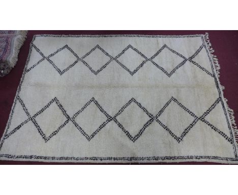 A Moroccan Berber Beni Ourain carpet, with double diamond design, 326 x 219cm 