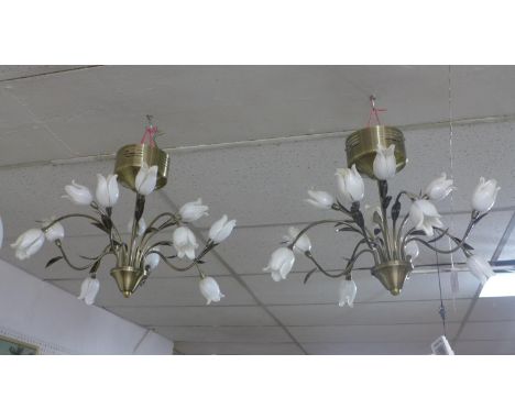 A pair of 12 branch chandeliers by Dar Lighting, with white glass tulip shades and floral stems, H.38 W.55cm 
