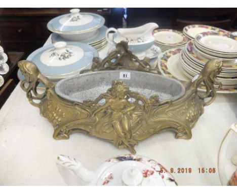 A large cast gilt brass art nouveau planter with lead liner, 54cms by 24cms approx.