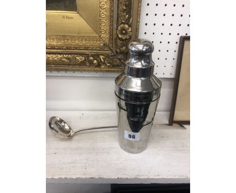 A vintage chrome cocktail shaker and a French silver plated toddy ladle