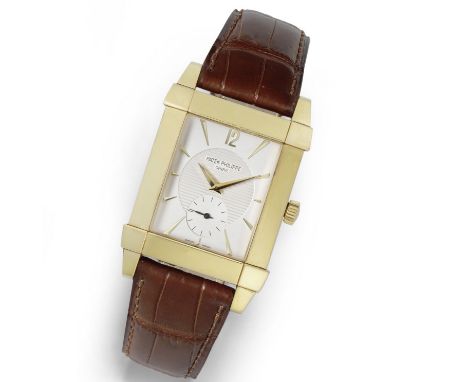 Patek Philippe. A fine 18K gold manual wind rectangular wristwatchModel: GondoloReference: 5111Date: Circa 2006Movement: 18-j