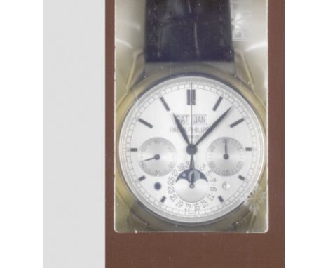 Patek Philippe. A fine and rare double factory sealed 18K white gold manual wind perpetual calendar chronograph wristwatch wi