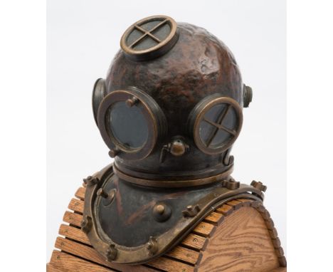 A Swedish 12-bolt diving helmet by Erik Andersson:, the circular top and side windows with guards, circular front window with