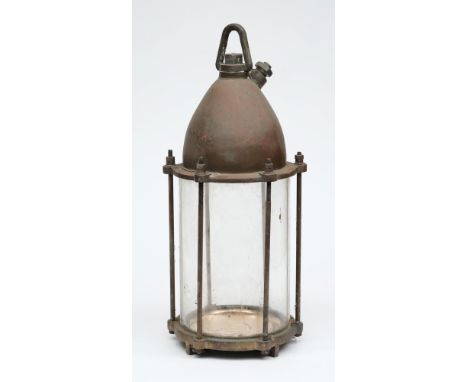A submarine flood lamp by Siebe Gorman & Co Ltd, London:, the domed cover with swivel suspension and power inlet, over a sing