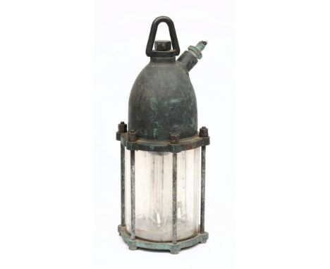 A Siebe Gorman sodium flood lamp:, the domed top with swivel suspension and power inlet over three bulbs with glass well and 