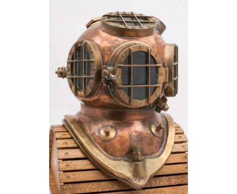  A Danish 2-bolt diving helmet:, the four oval observation windows with guards, the front window hinged to one side, wing nut