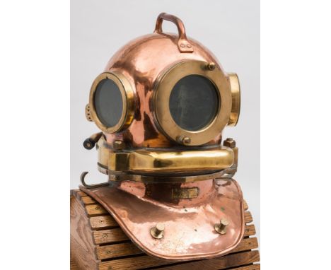 A Russian 3-bolt helium diving helmet:, date stamped '1980';. riveted handle to top, circular windows, rear outlet with head 