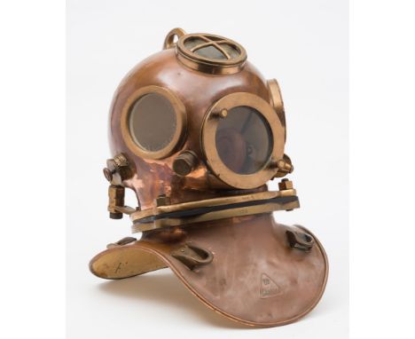 A Draeger self contained DM.40 diving helmet:, number '388' (matching), riveted handle to top , circular observation windows,