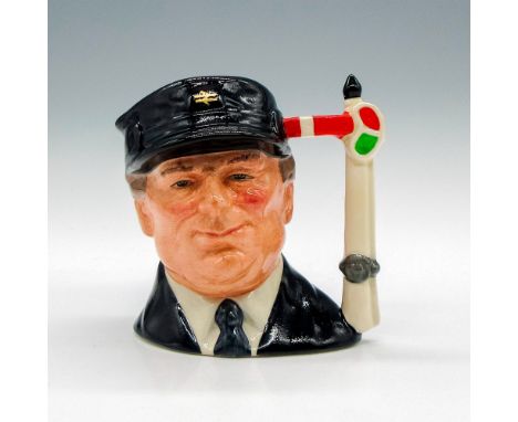 Black cap and coat; white shirt. Each jug in the Journey Through Britain series was given a specially designed backstamp rela