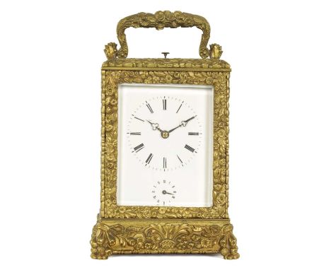 A MID 19TH CENTURY FRENCH GRAND SONNERIE REPEATING CARRIAGE CLOCK the gilt brass case with relief foliate decoration enclosin