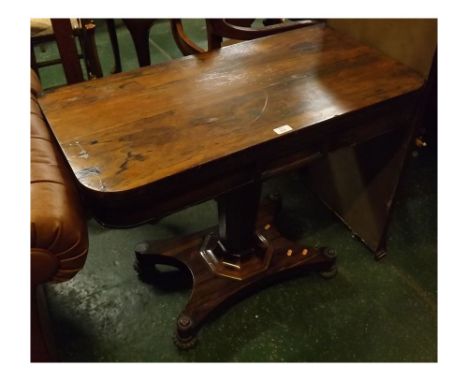 William IV rosewood flip-top card table, with green baize interior, supported on a canted column terminating in a quatrefoil 