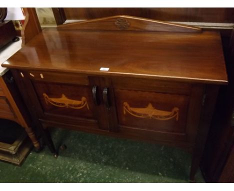 Early 20th century mahogany side cabinet, with plain rectangular top and architectural back, to hinged and inlaid doors and r