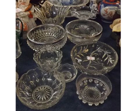 Group comprising ten assorted 20th century cut and moulded glass bowls, two with silver plated mounts, a pedestal bowl with c