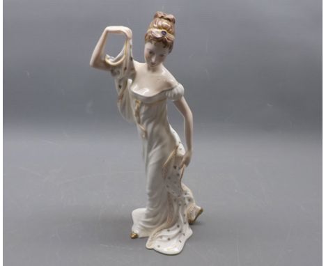 Coalport model of a figure with a robe with gilded clover decoration, modelled by Douglas V Tootle, No 340 out of 500 edition