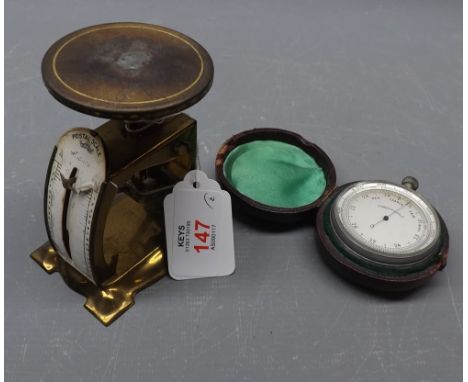 Small pair of brass letter balance scales together with a leather cased travelling compass in a nickel case (2)  