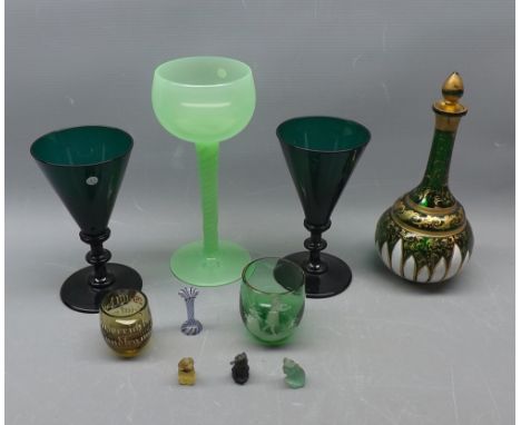 Pair of 19th century green glass wine glasses with knopped stems, together with a further green Bohemian glass small decanter