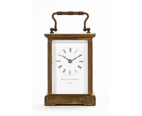 A Matthew Norman London brass carriage clock, timepiece only.  Height excluding carrying handle 10.5 cm.