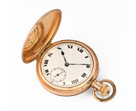 A gold plated full hunter pocket watch, with Dennison Star case and Swiss 15 jewel movement. CONDITION REPORT: The movement w