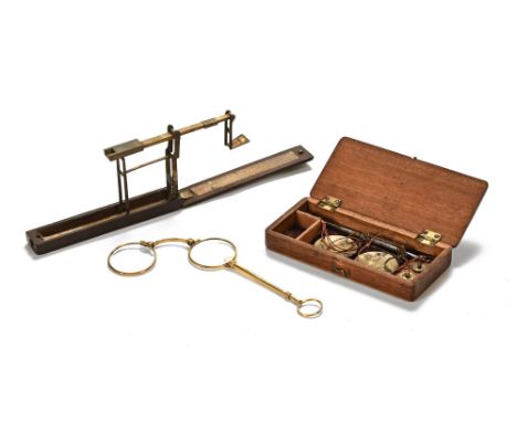 A 19th century folding gold scale, a similar balance and pair of lorgnettes. CONDITION REPORT: :  The folding gold scale lift