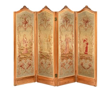 A late Victorian walnut fourfold draught screen circa 1885, each panel with needlepoint designs depicting possibly the four s