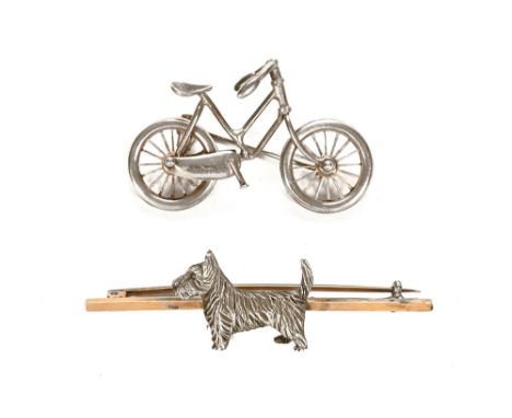 A 9 ct gold tie pin with white metal Scottie dog adornment, +/- 6 cm, together with a white metal bicycle tie pin (2). (see i